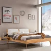 Wohnen Betten<Bett aus Wildbuche massiv mit Kunstleder - Syanta