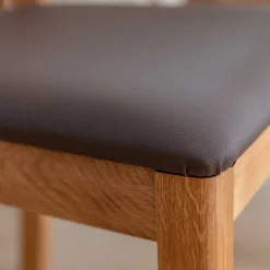 Wohnen Stühle<Esstischstuhl aus Wildeiche mit Kunstleder Sitz - Ernestan
