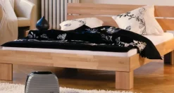 Wohnen Betten<Massivholzbett Logan aus Buche